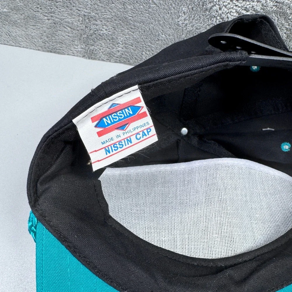Vintage Heilig Meyers Furniture Embroidered Snapback Hat Black Teal Nissin Cap